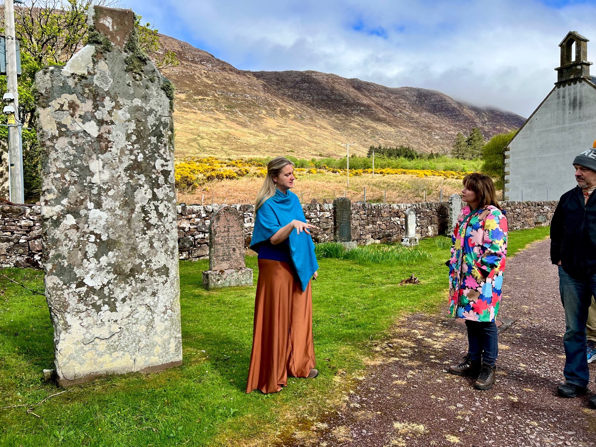 Scotland At Last: Image of Catherine Stewart leading a tour of the graveyard in Applecross Scotland