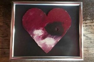 whole-hearted: image of a painted heart in a frame