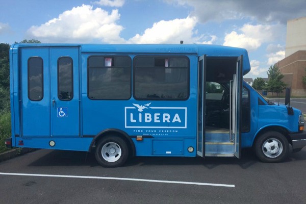 Do Yourself a Favor: Thoughts on Self-Care and Self-Love: Image of blue Libera Bus