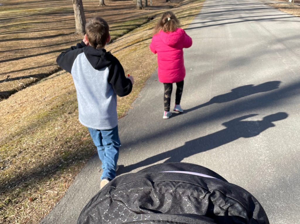 Parenting Tips from the wife of a child safety professional--image of two kids and a stroller