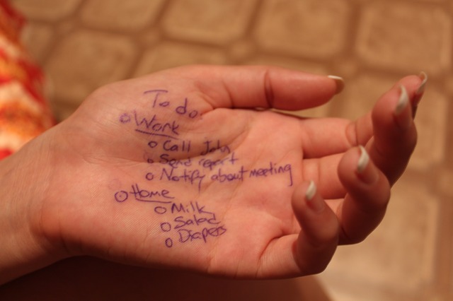 Stress Management image with a to-do list written on a woman's hand.