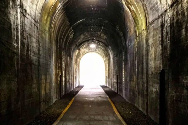 When the end is near: Image of a tunnel with light on other side