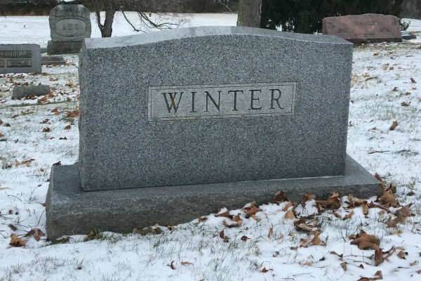Winter: image of a gravestone marked Winter, in the snow
