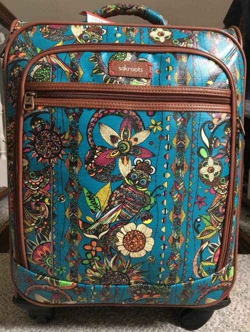 Ireland 101: Image of a colorful carry-on suitcase. 